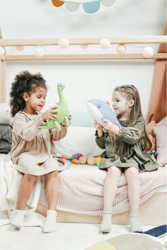 Playing with stuffed animals Playing with stuffed animals